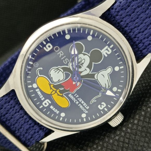 Vintage 1986 Oris Disney Manual Mens Silver Watch W/Cloth Strap & Mickey accents - Picture 1 of 8